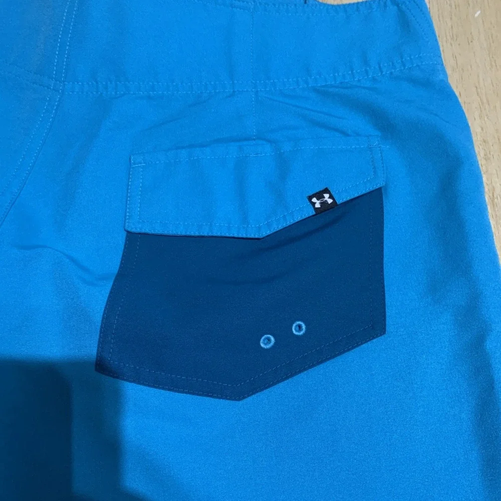 Under Armour Swim Trunks Men s 32 Teal Loose Heatgear Flap Pocket Beach Swimming